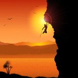 Extreme rock climber  Zachód Słońca Fototapeta