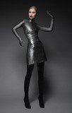 Fashion shot of a woman in a silver suit  Ludzie Obraz