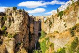 Bridge of Ronda, a famous white villages of Malaga, Spain a  Architektura Plakat