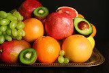 Assortment of fruits on table, close-up  Obrazy do Kuchni  Obraz