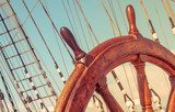Steering wheel of old sailing vessel Styl Marynistyczny Fototapeta