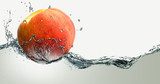 Ripe peach and splashes of water. Owoce Obraz
