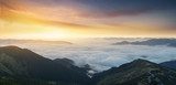 Mountain panorama during sunrise. Beautiful natural panoramic landscape in the summer time Fototapety Góry Fototapeta