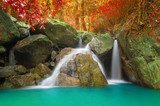 Waterfall in autumn forest. Fototapety Wodospad Fototapeta