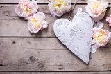 Pink peonies flowers  and decorative heart on  vintage  wooden b Fototapety Pastele Fototapeta