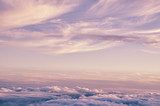 Abstract background with pink, purple and blue colors clouds. Sunset sky above the clouds. Dreamy fantasy background in soft pastel colors. Fototapety Pastele Fototapeta