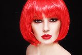 Portrait of young beautiful sexy girl with stylish make-up and fancy bob style red wig Obrazy do Salonu Fryzjerskiego Obraz