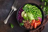 vegan lunch bowl. Avocado, red rice, tomato, cucumber, red cabbage, green peas vegetables salad Obrazy do Jadalni Obraz