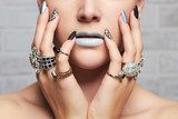 woman's hands with jewelry rings.close-up beauty and fashion girl, make-up and manicure Obrazy do Salonu Kosmetycznego Obraz