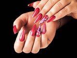 Red nails and floral deign, on black background. Obrazy do Salonu Kosmetycznego Obraz