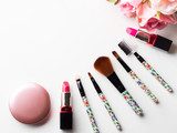 Make up products lipstick, blush and tools brushes with pink roses flowers on white background. Lifestyle woman still life Obrazy do Salonu Kosmetycznego Obraz