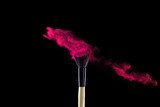 Make-up brush with powder explosion on black background Obrazy do Salonu Kosmetycznego Obraz