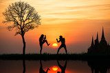 Silhouette of a thai's boxing at sunset  Sport Plakat