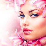Beautiful Girl With Orchid Flowers. Beauty Woman Face  Ludzie Plakat