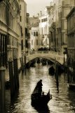 Gondola silhouette on venetian canal.  Fototapety Czarno-Białe Fototapeta