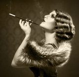 Smoking Retro Woman. Vintage Styled Black and White Photo  Fototapety Sepia Fototapeta
