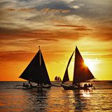 sailing on sunset. Boracay island,Philippines  Zachód Słońca Fototapeta