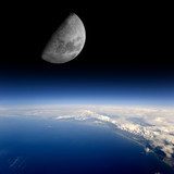 The Moon rises over planet Earth.  Niebo Fototapeta