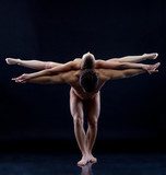 Image of two naked acrobats showing trick  Erotyka Obraz