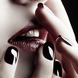 Close-up of lips and nails  Erotyka Obraz