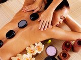 Adult woman having hot stone massage in spa salon  Obrazy do Salonu SPA Obraz