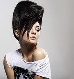 Updo Hair. Woman with Trendy Hairstyle with Diamond Earrings  Obrazy do Salonu Fryzjerskiego Obraz