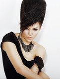 Updo Hair. Woman with Trendy Hairstyle with Diamond Earrings  Obrazy do Salonu Fryzjerskiego Obraz