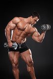 Handsome muscular bodybuilder  Fototapety do Siłowni Fototapeta