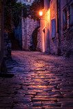 Old paved street at night -Pula ,Croatia  Fototapety Uliczki Fototapeta