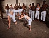 Capoeria Fighters Kicking and Dodging  Fototapety do Szkoły Tańca Fototapeta