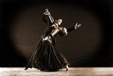 Latino dancers in ballroom isolated on black  Fototapety do Szkoły Tańca Fototapeta