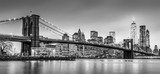 Brooklyn bridge and New York City Manhattan downtown skyline at dusk with skyscrapers illuminated over East River panorama. Panoramic composition. Mosty Obraz