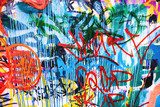 Closeup of damaged colorful urban wall texture Fototapety Graffiti Fototapeta