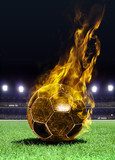 fiery soccer ball on field  Stadion Fototapeta