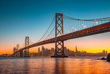 San Francisco skyline with Bay Bridge at sunset, California, USA Mosty Obraz