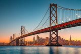 San Francisco skyline with Oakland Bay Bridge at sunset, California, USA Mosty Obraz