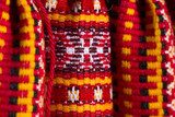 Tradycyjny wzór tkaniny w czerwono-żółtych barwach Folklor Fototapeta