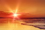 Zachód słońca na plaży  Zachód Słońca Fototapeta