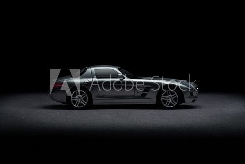 Side view of luxury sports car over black background  Fototapety do Pokoju Nastolatka Fototapeta