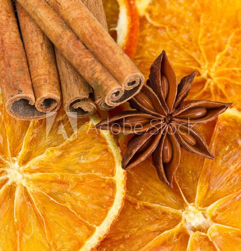 Cinnamon sticks, star anise and dried orange cuts  Fototapety do Kawiarni Fototapeta
