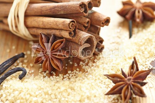 Cinnamon sticks, brown sugar and anise stars  Fototapety do Kawiarni Fototapeta