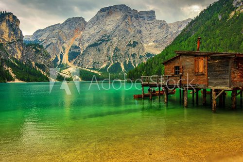 Boathouse at the Braies Lake on a cloudy day,Dolomites,Italy  Krajobraz Fototapeta
