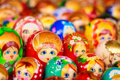 Colorful Russian nesting dolls at the market  Folklor Fototapeta