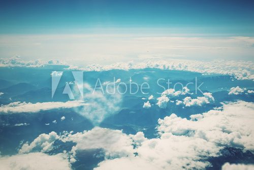 Heart shaped cloud on blue sunny sky.  Niebo Fototapeta