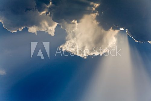 Clouds in sky with sunrays on sunrise  Niebo Fototapeta