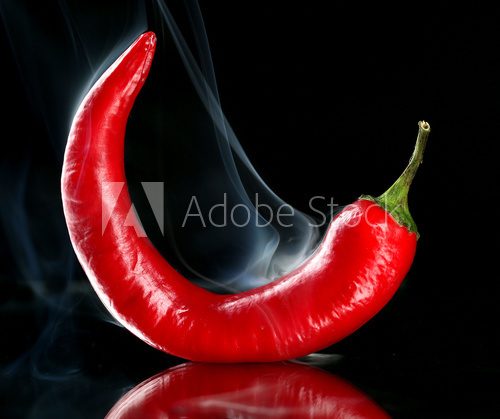 Red hot chili pepper isolated on   black  Plakaty do kuchni Plakat