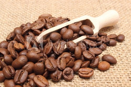 Heap of coffee on wooden spoon  Kawa Fototapeta