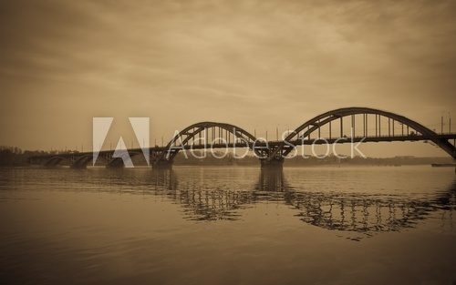 Bridge over river with vignette effect. Retro style image  Fototapety Mosty Fototapeta