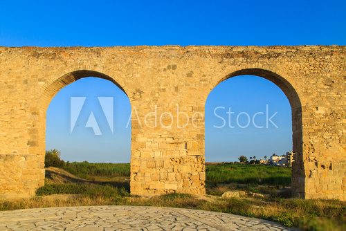 Old Greek aqueduct in warm sunset light in Larnaca, Cyprus  Prowansja Fototapeta