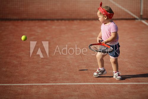 little girl plays tennis  Sport Plakat